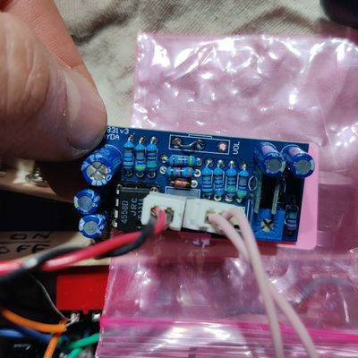 pre-printed circuit board with resistors, capacitors, an op-amp, a trim-pot and two xhr connectors